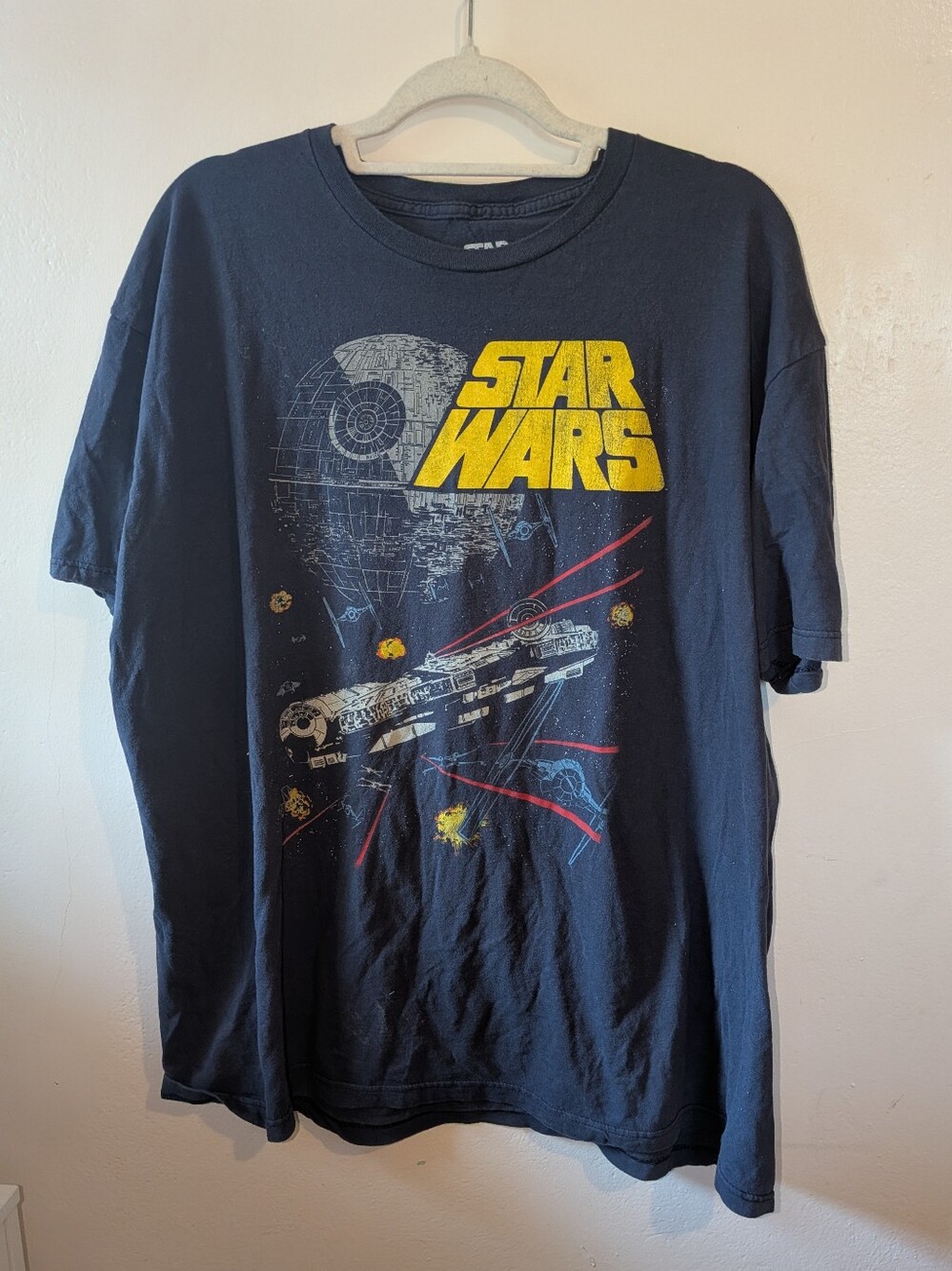 Star Wars Black Short-Sleeve Tee with Yellow Logo and Space Graphic Size 2XL